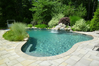 Inspiration for a timeless pool remodel in Boston