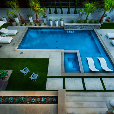 Example of a mid-sized minimalist backyard rectangular hot tub design in Dallas