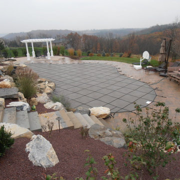 North Whitehall custom pool with boulder waterfall, slide, & separate spa