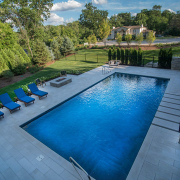 Oakbrook, IL Modern Swimming Pool and Hot Tub with Steppers
