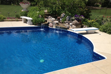 Example of a concrete and custom-shaped pool fountain design in Chicago