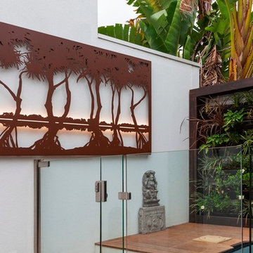 Outdoor living: By the pool with Entanglements laser cut metal art
