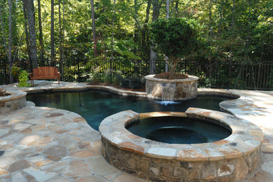 This is an example of a traditional swimming pool in Raleigh.