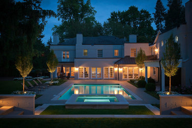 Transitional backyard rectangular hot tub photo in Detroit