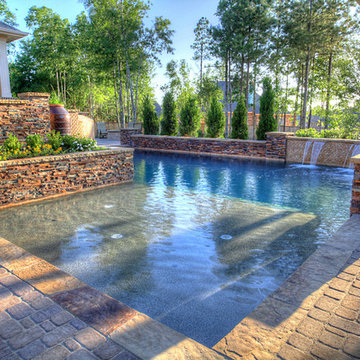 Outdoor Oasis: Pool, Outdoor Kitchen, Patio, Pergola and More