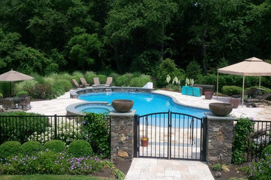 Large elegant pool photo in Philadelphia