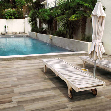 Outdoor pool patio with porcelain tile floors