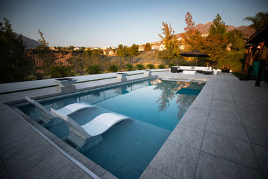 Inspiration for a modern pool remodel in Orange County