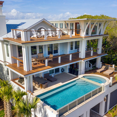 Inspiration for a modern aboveground pool remodel in Charleston with decking