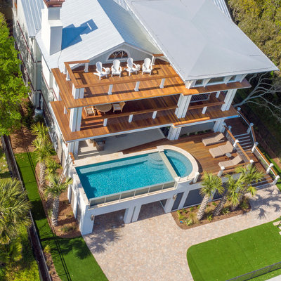 Pool - modern aboveground pool idea in Charleston with decking
