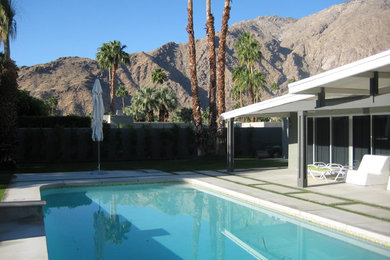 Hot tub - large contemporary backyard concrete and rectangular hot tub idea in Los Angeles