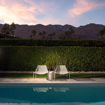 Inspiration for a mid-sized mid-century modern backyard rectangular pool remodel in San Diego
