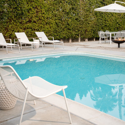 Mid-sized 1950s backyard rectangular pool photo in San Diego