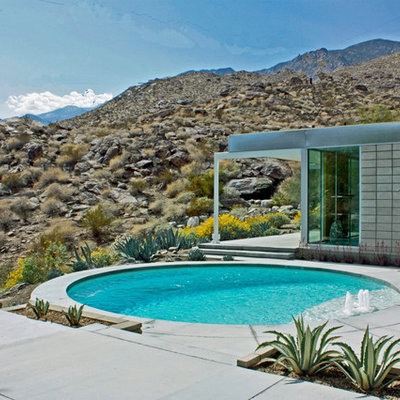 Pool - mid-sized 1960s backyard round and concrete pool idea in Los Angeles