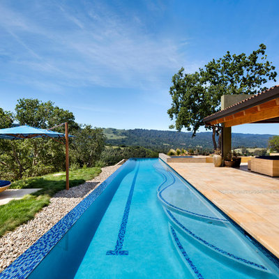 Hot tub - large southwestern backyard tile and rectangular lap hot tub idea in San Francisco