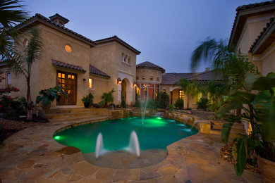 Inspiration for a mediterranean pool remodel in Austin