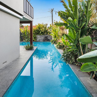 Inspiration for a tropical l-shaped pool in Other.