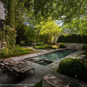 Peachtree battle lap pool with submerged spa and water feature