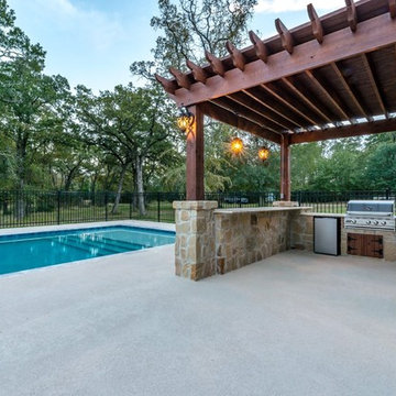 Pergola and Outdoor Kitchen with Beautiful Pool