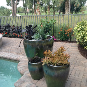Planters accentuate pool areas and patios