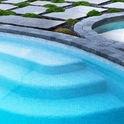 Example of a large minimalist front yard decomposed granite and round pool landscaping design in Melbourne