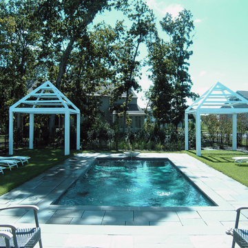Pool and fountain with cabanas