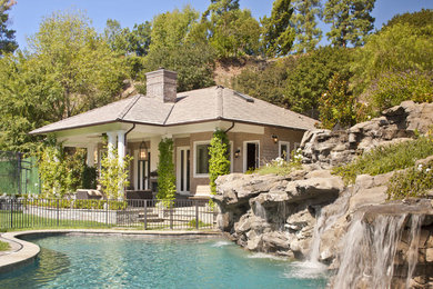 Inspiration for a timeless custom-shaped natural pool remodel in Los Angeles