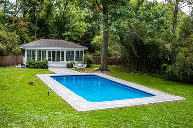 Inspiration for a transitional pool remodel in New York