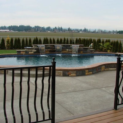 Inspiration for a large mediterranean backyard concrete and kidney-shaped aboveground pool fountain remodel in Portland