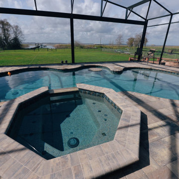Pool and Spa with Panoramic Screen Enclosure in Saint Cloud, Florida
