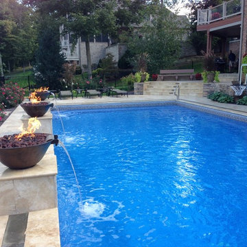 Pool design with Travertine and Bluestone inlay
