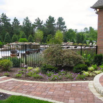 Pool Fence with Paver Walkway to Swimming Pool