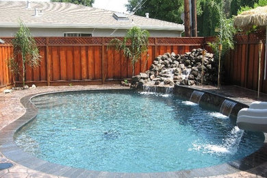 Example of a custom-shaped pool fountain design in San Francisco