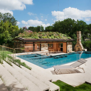 Inspiration for a contemporary backyard l-shaped pool house remodel in Austin