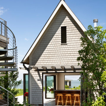 Pool House with bar facing the water