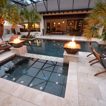 Pool in Lake Mary, FL with sun shelf, swim up bar, fire bowl, floor lights