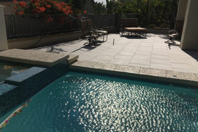 Inspiration for a timeless pool remodel in Orange County