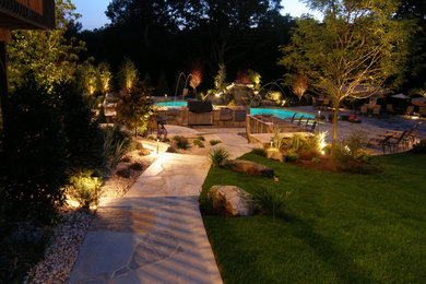 Inspiration for a large timeless pool remodel in New York