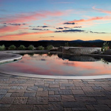 Pool project overlooking New Hampshire mountains
