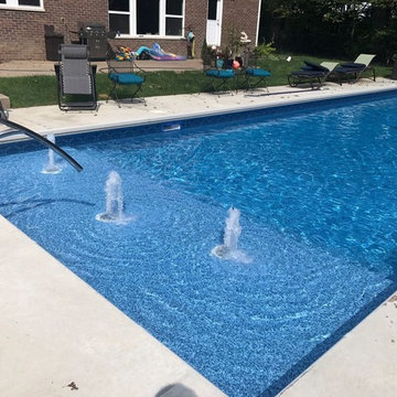 Pool Remodel with Modern Water Features
