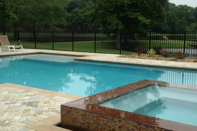 Inspiration for a timeless pool remodel in Raleigh