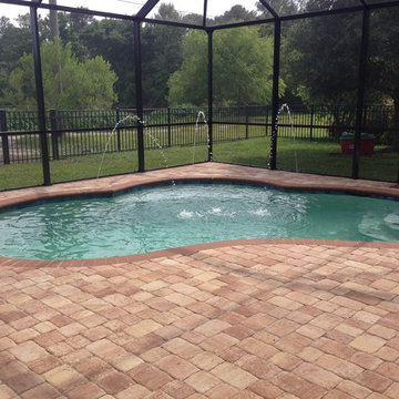 Pool with Pavers and Screened Enclosure