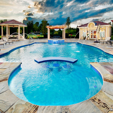 Pool with scalloped edges and raised spa in Bannockburn, IL
