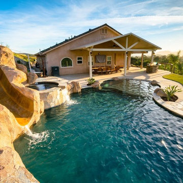 Pool with slide, water fall and fire feature!