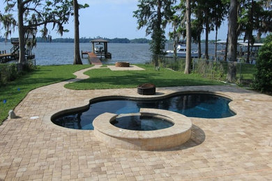 Pool - large indoor custom-shaped pool idea in Jacksonville