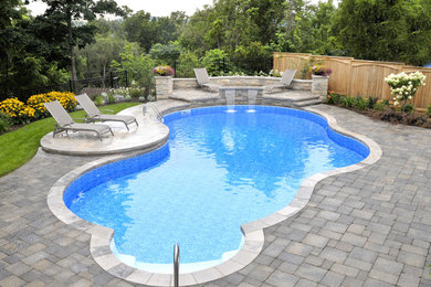 Minimalist pool photo in Toronto