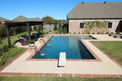 Inspiration for a large transitional backyard concrete and rectangular lap hot tub remodel in New Orleans