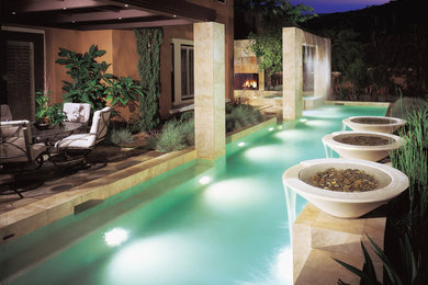 Example of a trendy lap pool fountain design in Orange County