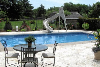 Inspiration for a backyard rectangular pool remodel in Other