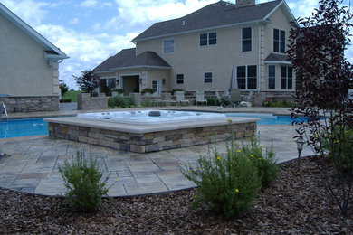 Design ideas for a contemporary swimming pool in Columbus.